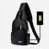 Sac bandoulière noir PU multifonction avec sangle et batterie externe attachée.
