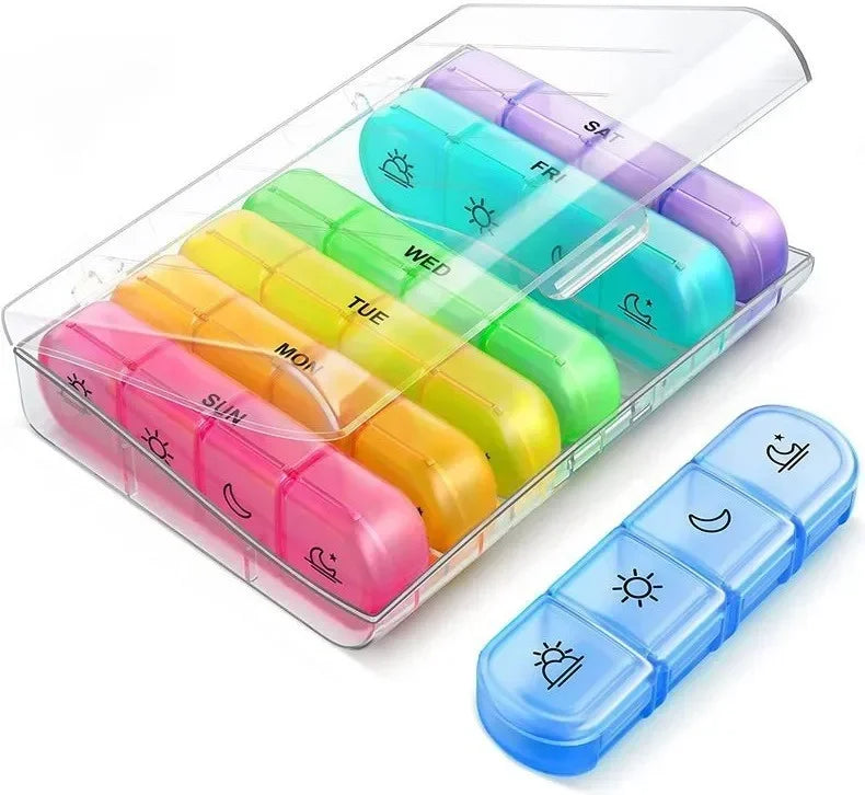 A clear plastic weekly pill organizer with seven colored compartments for daily medication