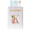 A pink leather passport holder featuring a gold initial K and a rose design.
