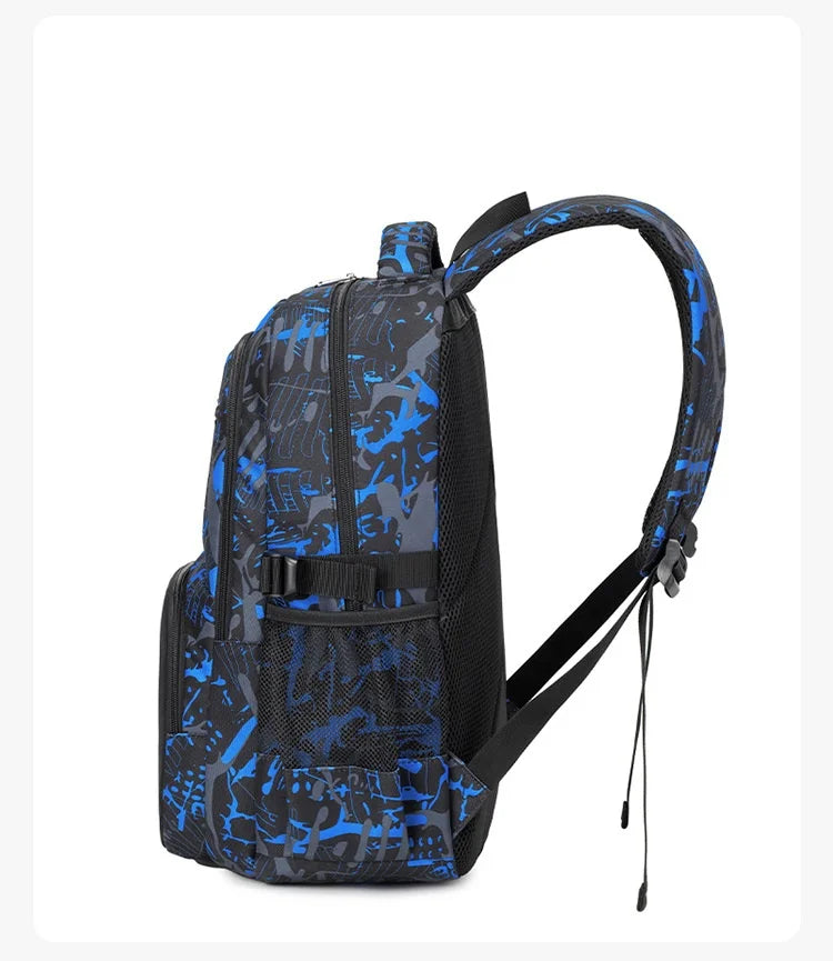 A black and blue graffiti-patterned waterproof backpack for boys.