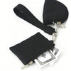 Black compact wristlet wallet with dual zip pockets and a leather strap, shown next to cash.