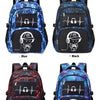 A set of waterproof graffiti backpacks in blue, black, red, and purple featuring a stylized skull design.