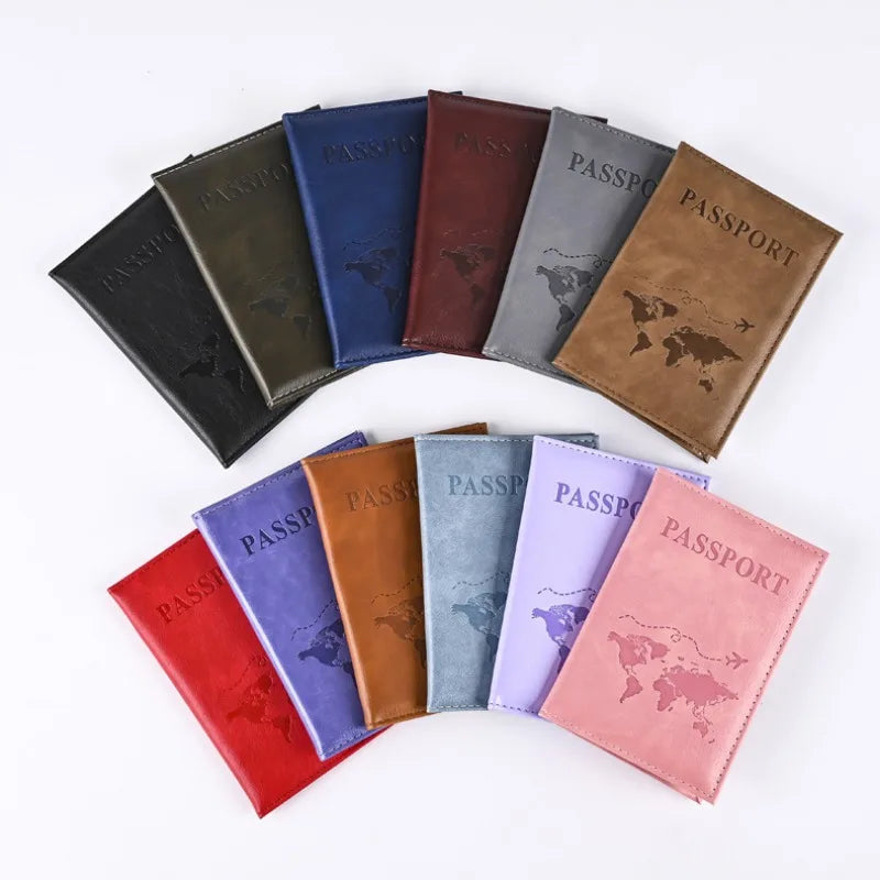 A collection of elegant pink leather passport holders in various shades and colors arranged on a white background.