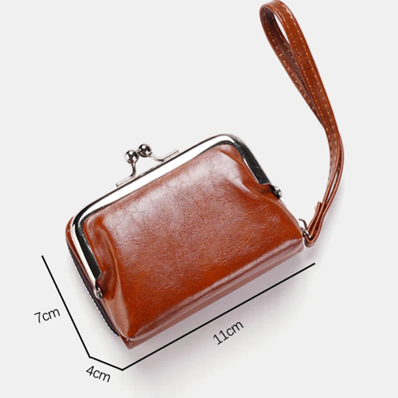 A brown vintage PU leather compact wallet with a coin pocket shown from above.