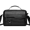 Black retro faux leather crossbody bag with a top handle and adjustable strap.