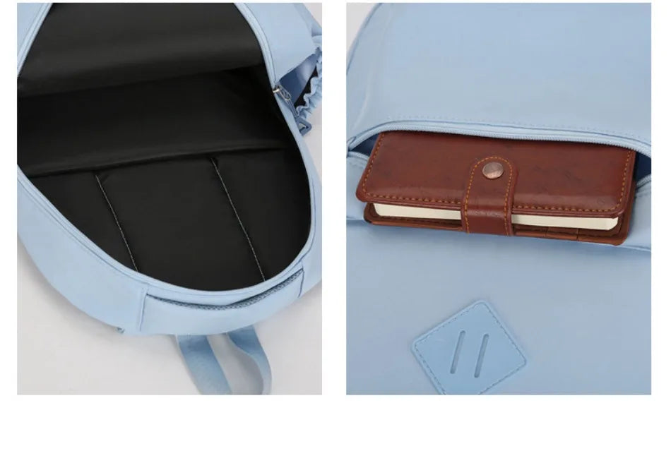 A light blue durable nylon commuter backpack showing the interior compartment and an exterior leather wallet.