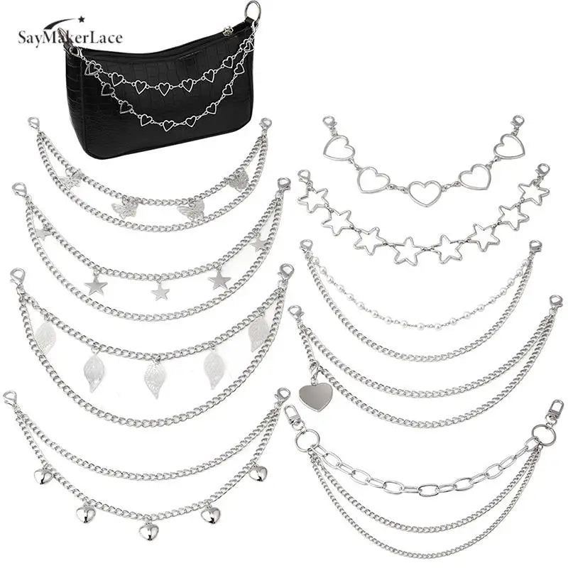 Black leather shoulder bag with multiple layers of silver metal chain straps and charms