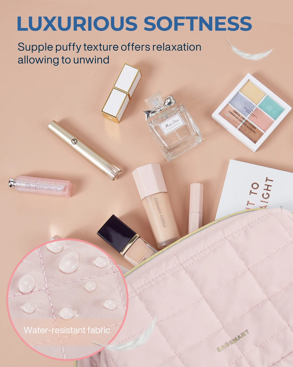 A pink padded makeup bag with a wide-open design featuring various beauty products and a silky fabric.