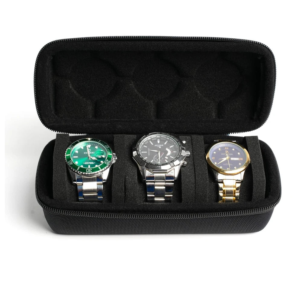A black leather watch organizer case holding three wristwatches.