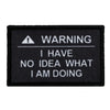 Black embroidered patch with white text warning I have no idea what I am doing