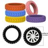 A set of five silicone luggage wheels in various colors including orange, blue, yellow, and purple.