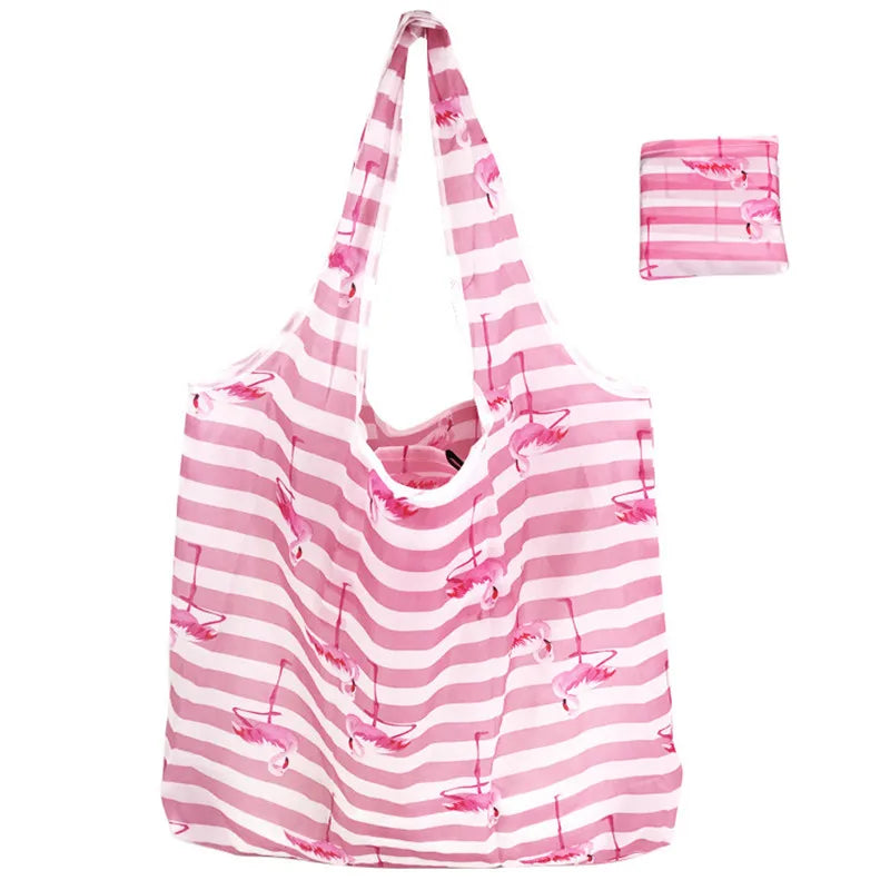 Pink and white striped reusable nylon tote bag with pink flamingo print