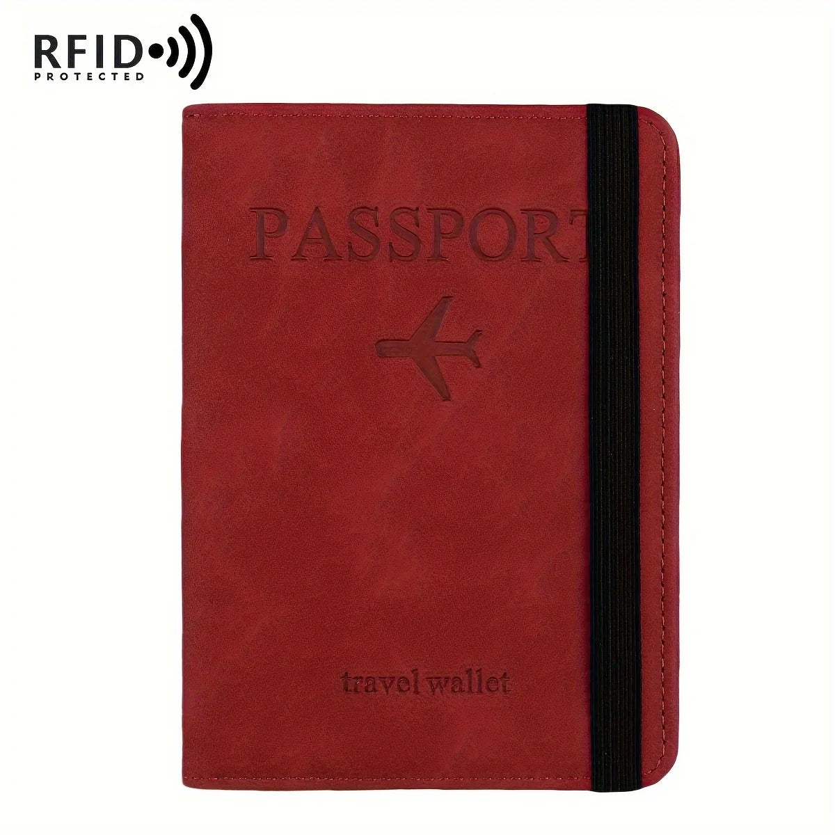 A deep red leather passport holder with a black trim and a silver airplane emblem.