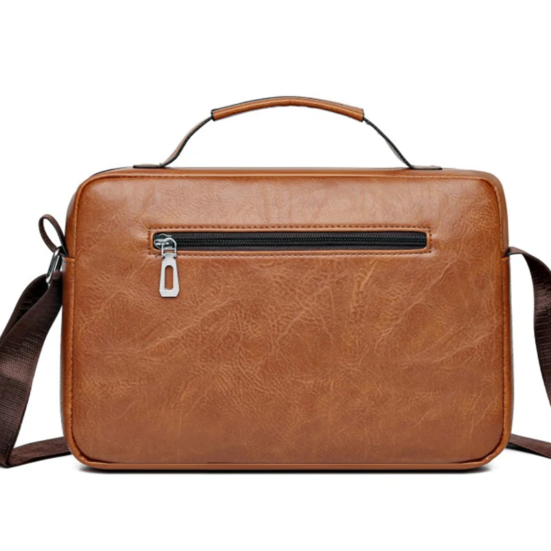 A brown faux leather crossbody bag with a zipper closure and a leather strap is shown against a white background.
