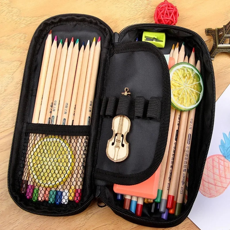 A black pencil case containing a set of colored pencils and an eraser, with a small backpack visible nearby.