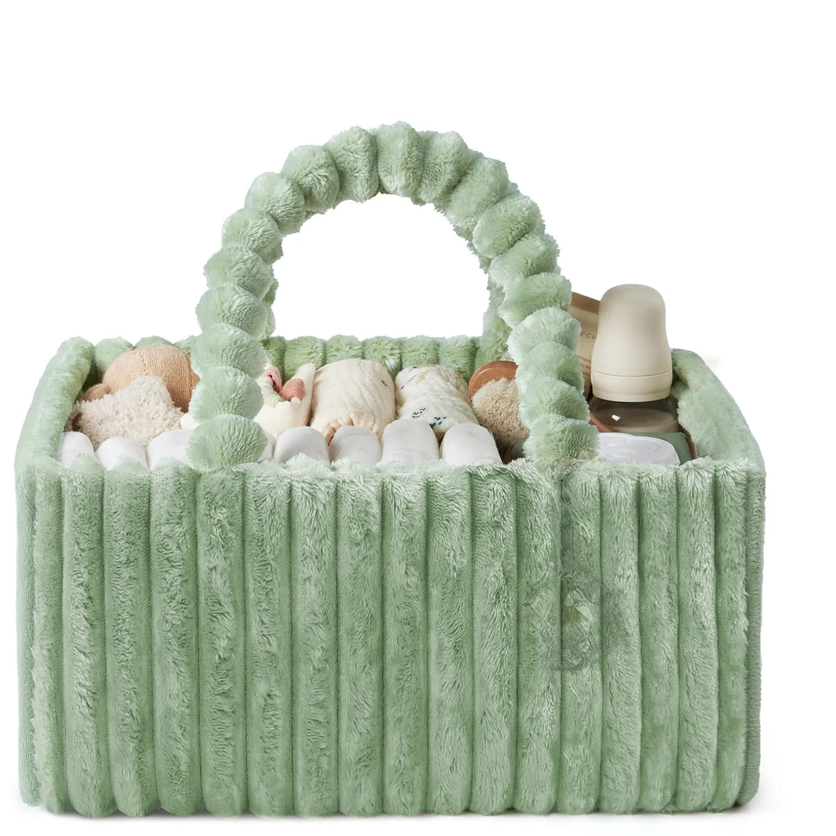 A green flannel diaper caddy organizer filled with soft white baby items and a bottle.