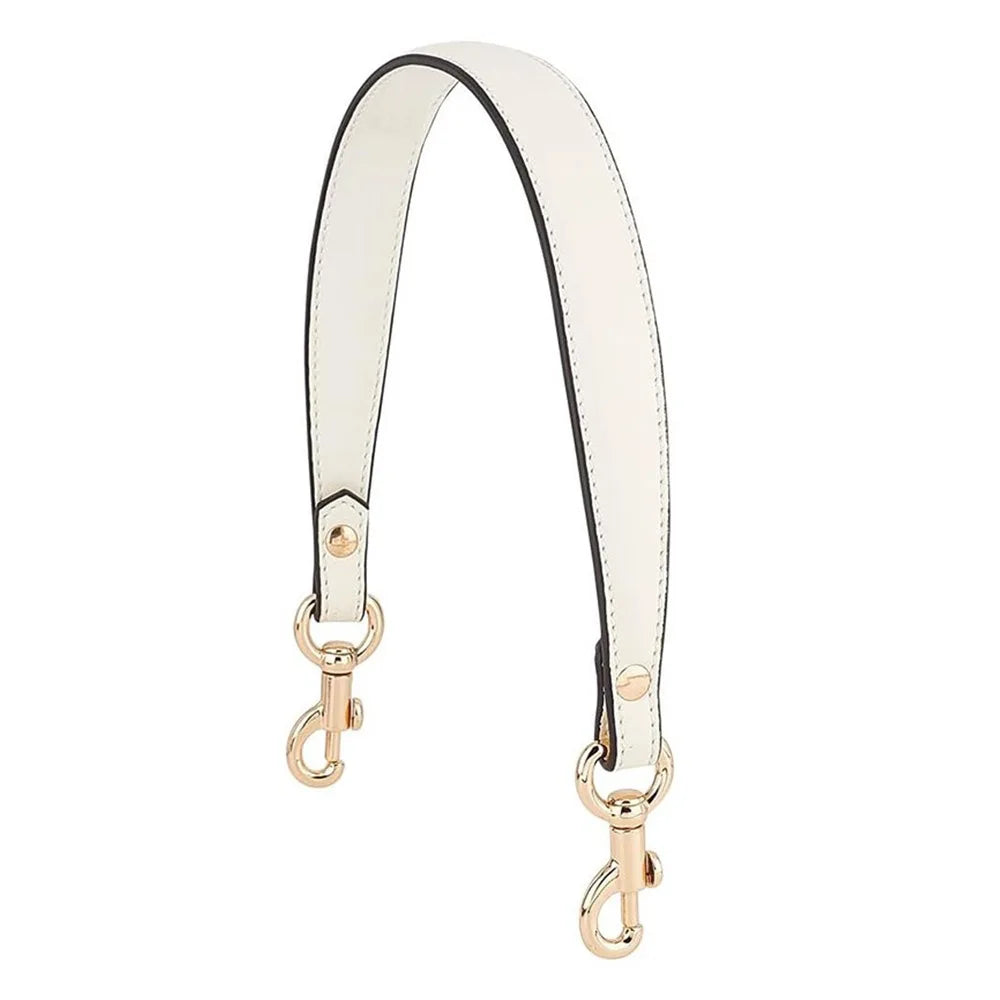 A white and black elegant PU leather detachable handbag strap with gold hardware.