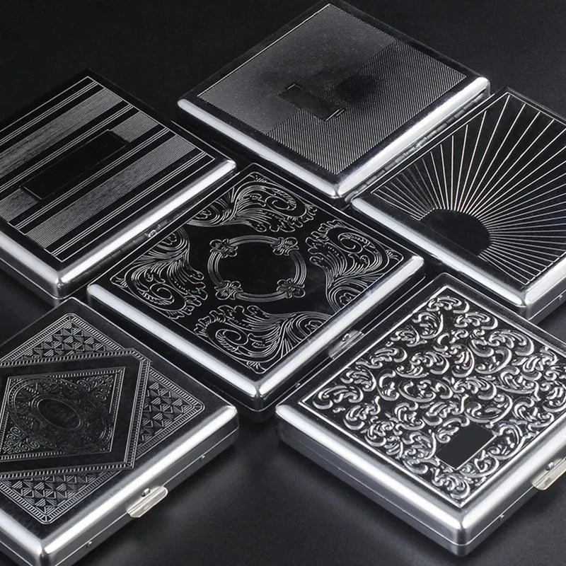 A collection of decorative metal cigarette storage boxes with intricate patterns and radiating designs.