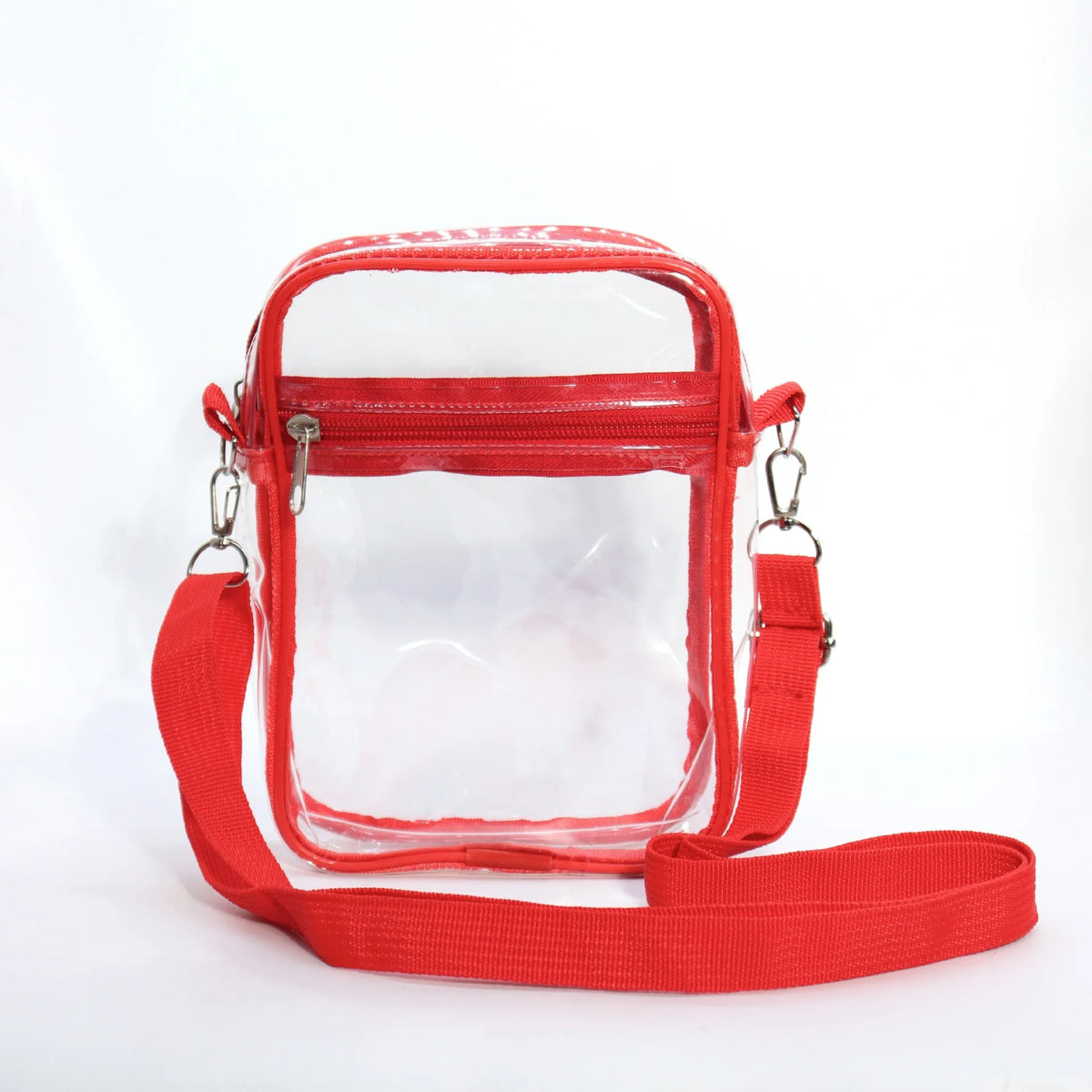 A bright red clear transparent crossbody bag with an adjustable strap against a white background.