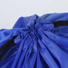 A close-up of a royal blue gym drawstring backpack with black accents and pleated fabric.
