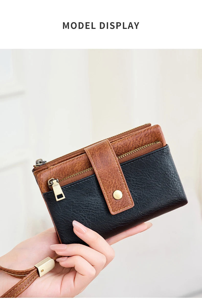 A brown leather multi-slot wallet is displayed in a hand against a light background.