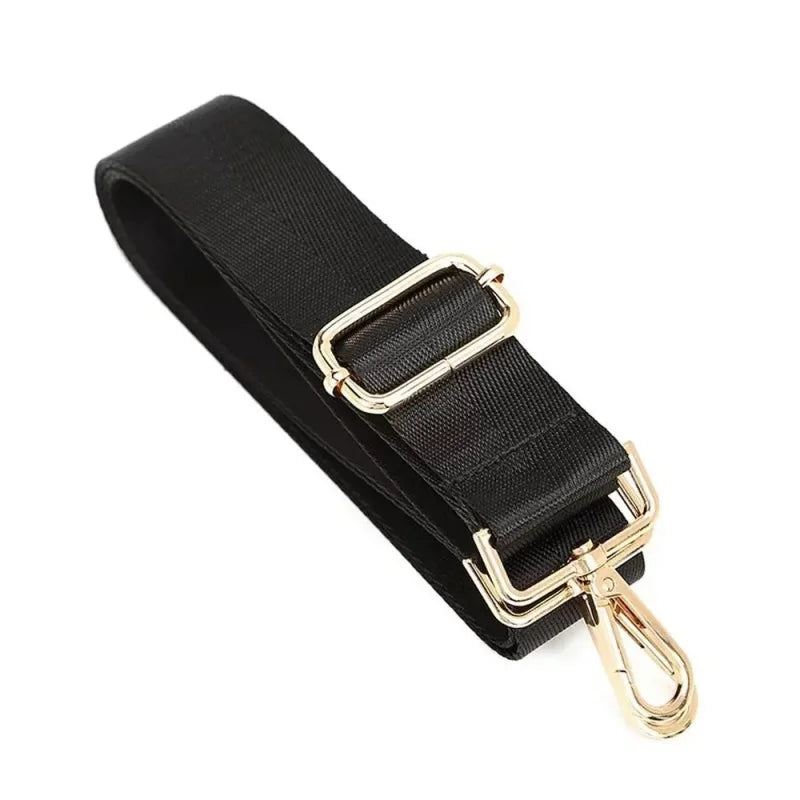 Black nylon bag strap with gold-toned buckle and hardware