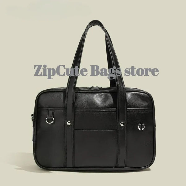 Black waterproof PU leather student messenger bag with silver hardware