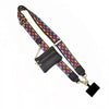 A black leather phone lanyard featuring a colorful patterned strap and a detachable wallet.