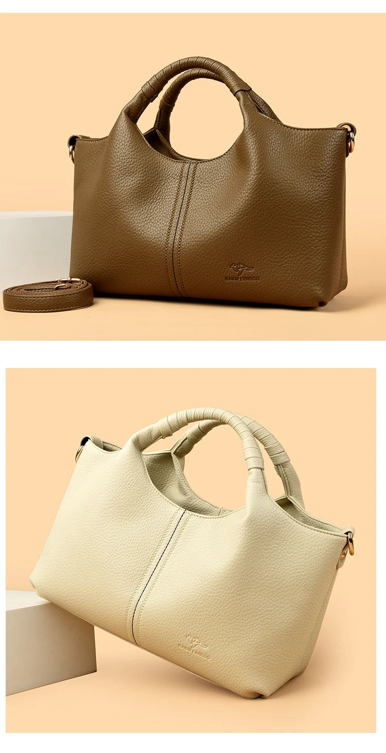 A brown luxury soft leather women's tote bag shown in a top-down view with a leather strap.