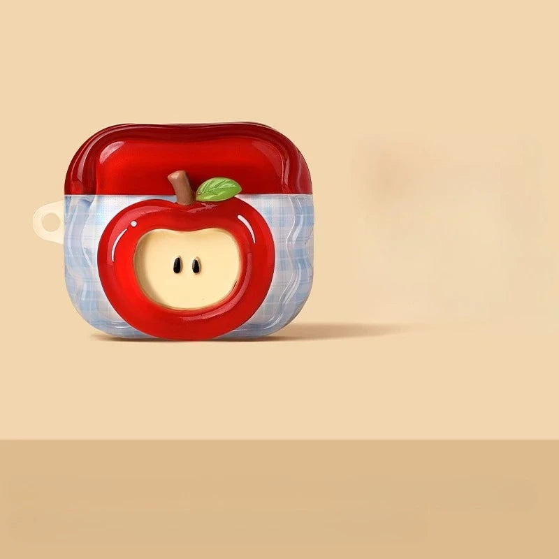 A red apple shaped earphone case with a white and blue striped background.