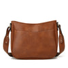 A brown PU leather shoulder crossbody bag with a flap closure and leather strap.