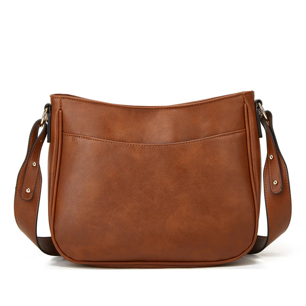 A brown PU leather shoulder bag with a flap closure and leather strap is shown from the back.