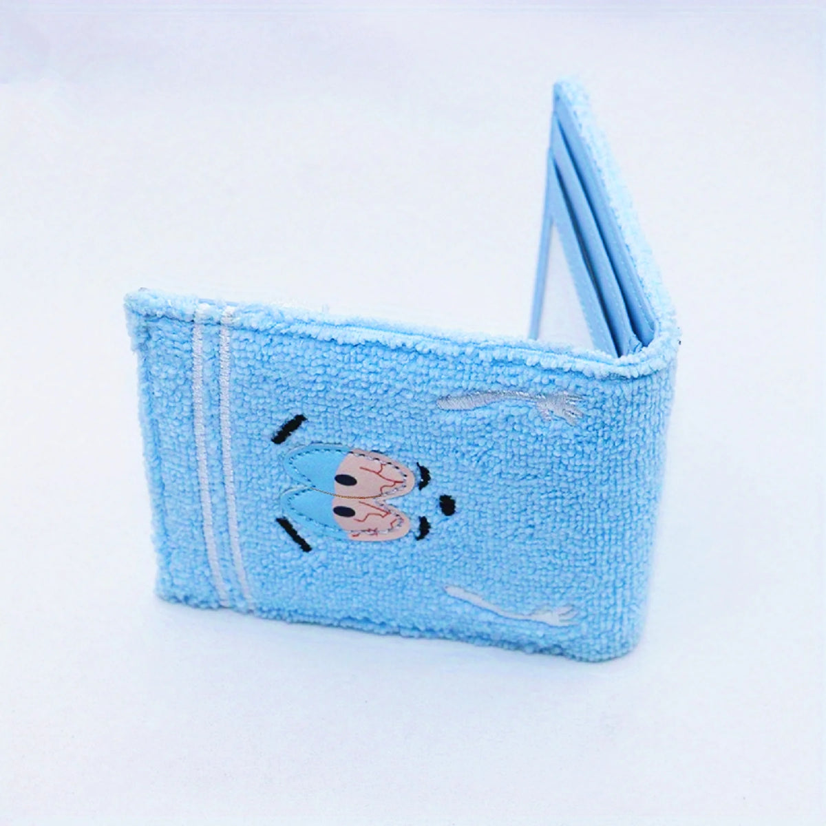 Light blue embroidered fabric wallet with a cute animal design