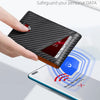 A hand holds a black RFID blocking men's bi-fold wallet over a smartphone displaying a scan rejection message.