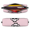 Pink elegant leather pencil case with a zipper showing various pens and pencils.