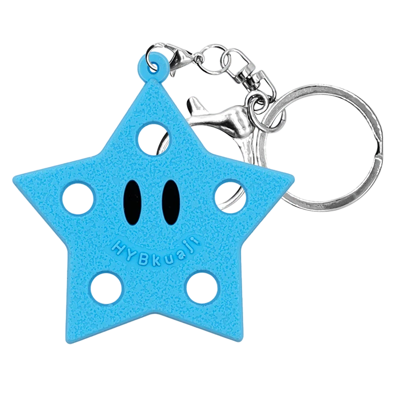 Porte-clés en forme d'étoile bleu vif en silicone avec anneau argenté.