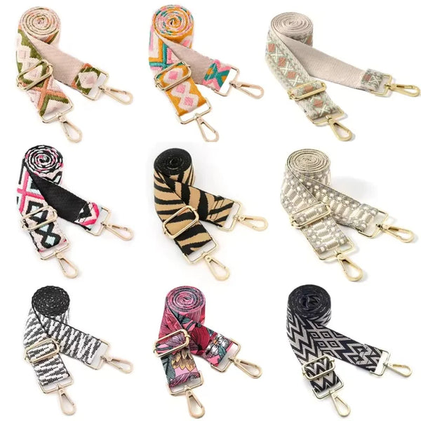 A collection of patterned nylon crossbody bag straps in various colors and textures.
