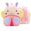 A pink cartoon animal plush backpack with purple horns and yellow accents.