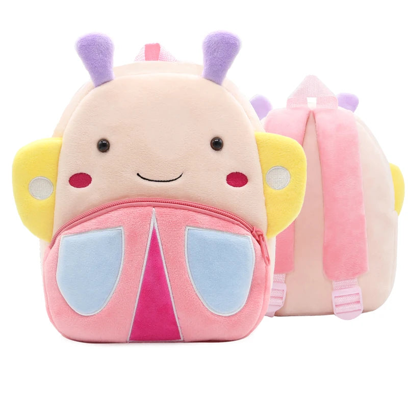 A pink cartoon animal plush backpack with purple horns and yellow accents.