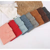 Collection de porte-passeport et portefeuille en cuir imperméable dans diverses nuances de marron, vert et rouge, resti