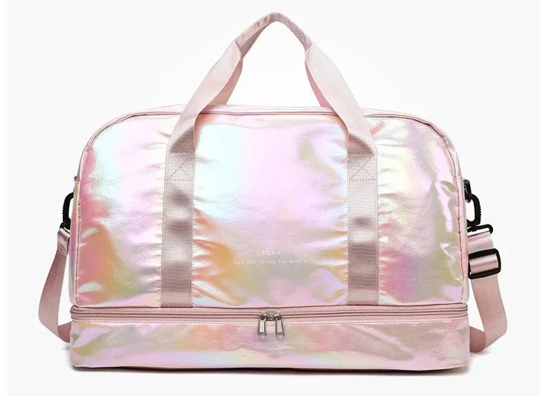 A pink iridescent nylon travel bag with light pink straps and a silver zipper.