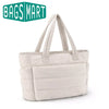 A beige canvas tote bag with light beige straps shown against a white background.