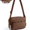 A brown crossbody shoulder bag with a leather strap and decorative tassel detail.