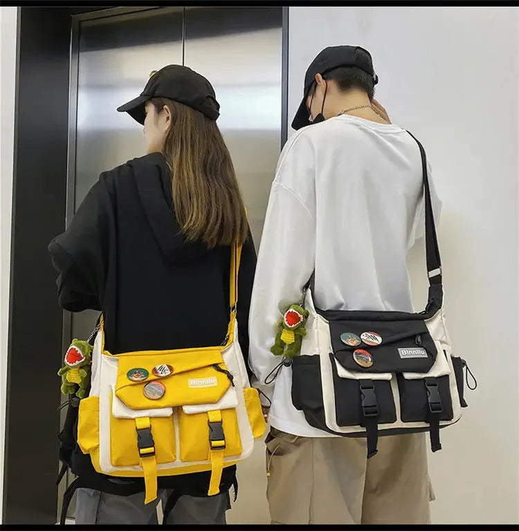 A woman wearing a black hat and white shirt carries a yellow nylon crossbody shoulder bag.