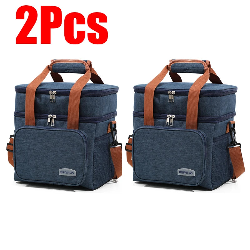 Deux sacs de pique-nique isothermes bleu marine à double paroi avec sangles et fermetures à glissière marron.