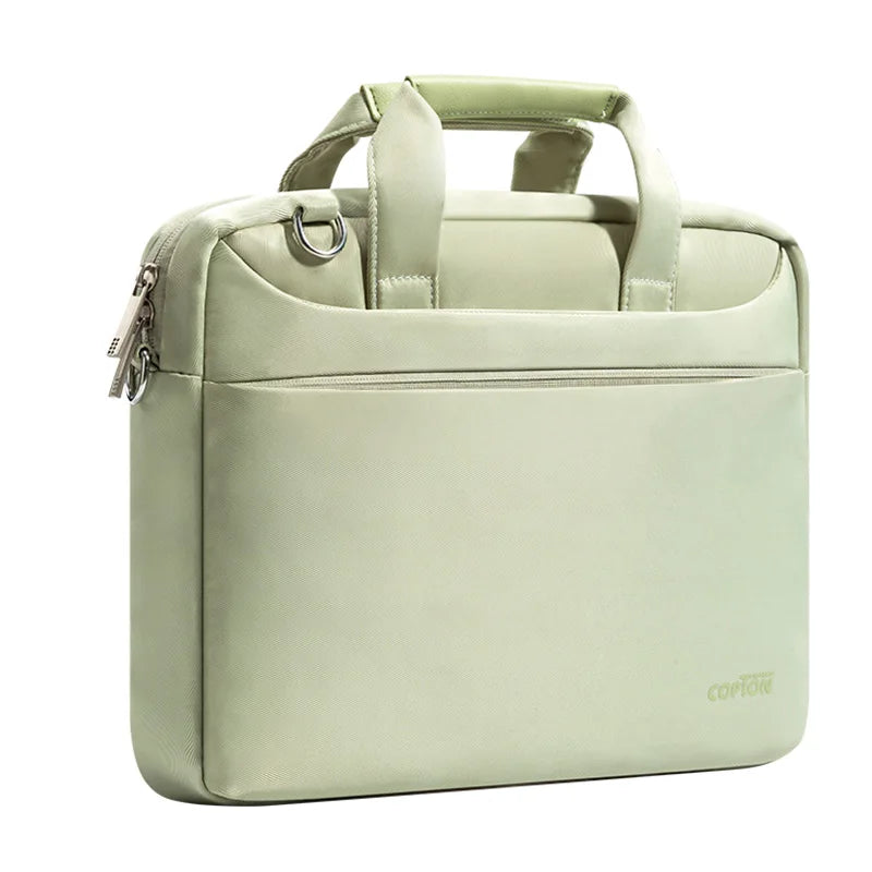A light sage green premium laptop sleeve designed for Mac and PC.