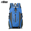 A blue waterproof hiking backpack with gray accents and black straps.