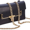A black leather clutch bag with a gold-tone diamond-cut curb chain strap.