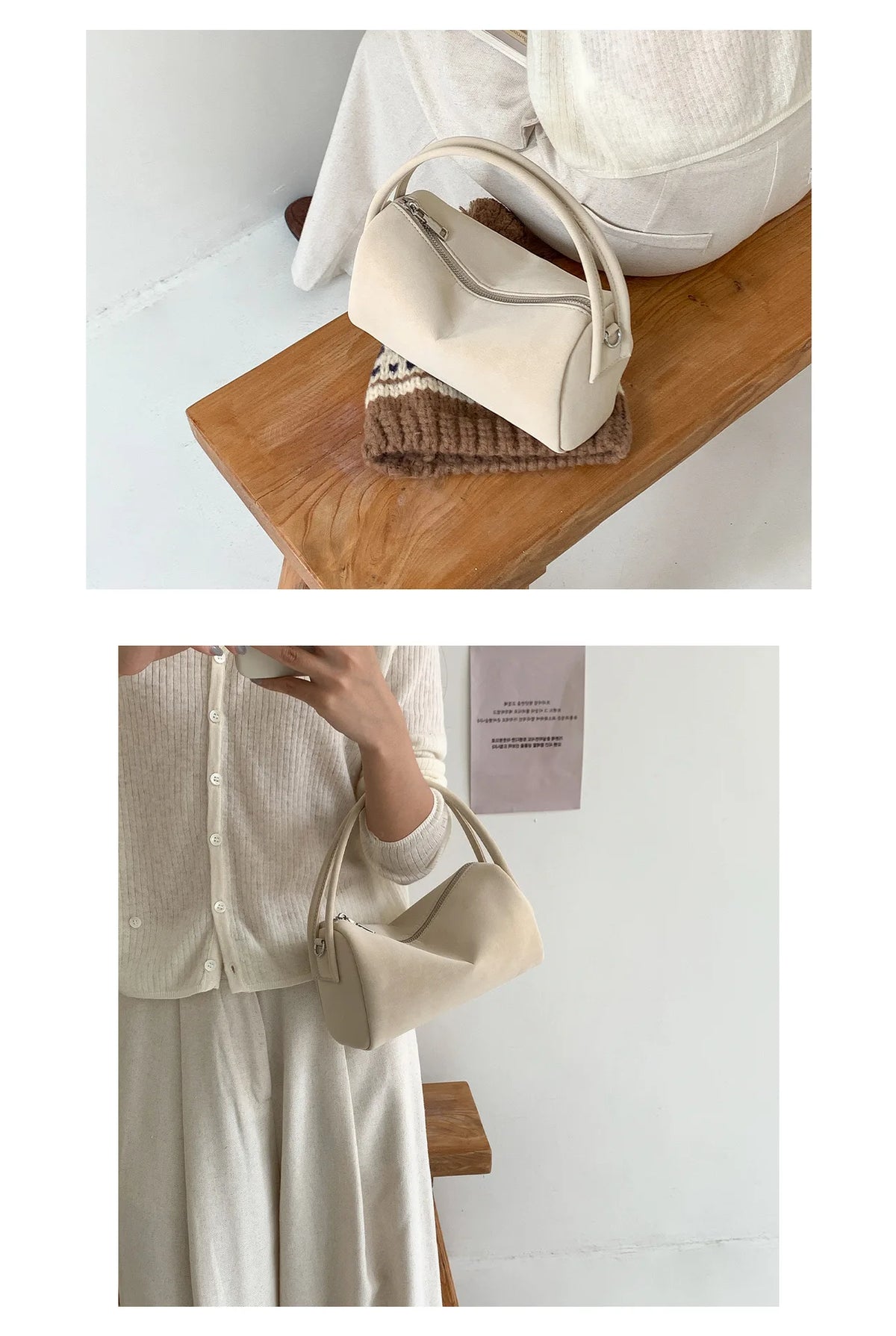 A beige faux suede crossbody bag resting on a wooden surface next to a knitted item.