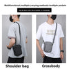 A black nylon crossbody bag worn across the body on a man, shown next to a gray shoulder bag.